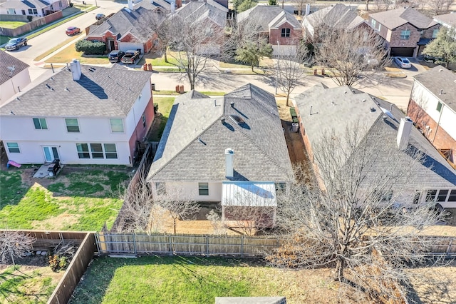 birds eye view of property with a residential view