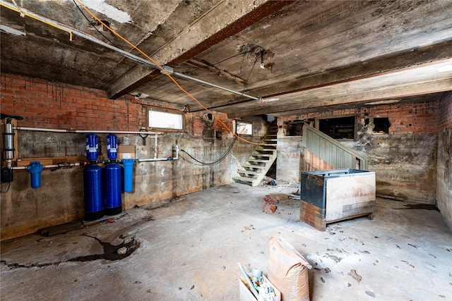 basement featuring stairway