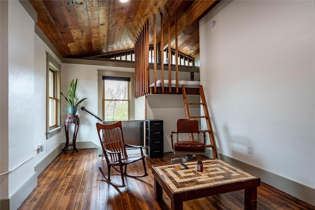 sitting room featuring hardwood / wood-style flooring, wood ceiling, baseboards, and lofted ceiling