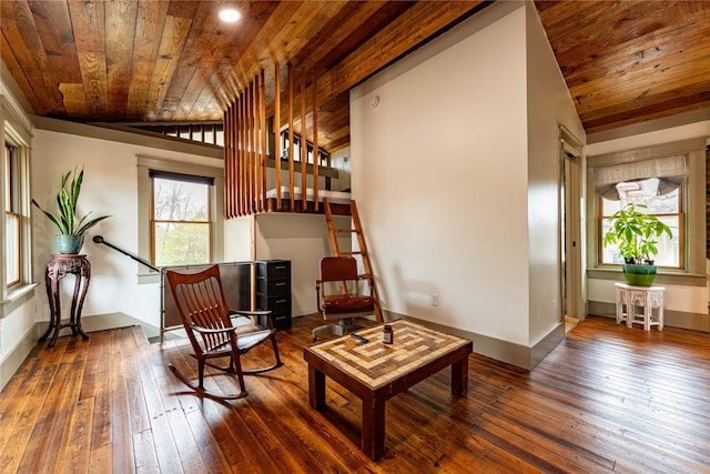 living area with wooden ceiling, wood-type flooring, and vaulted ceiling