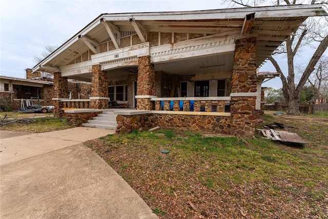 view of front of home with stone siding