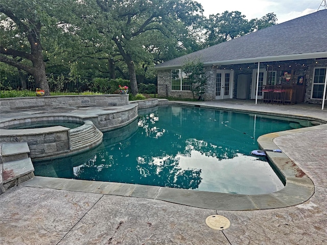 218 Fairview Ct, Decatur, TX 76234 - view of pool with french doors, a pool with connected hot tub, and a patio area
