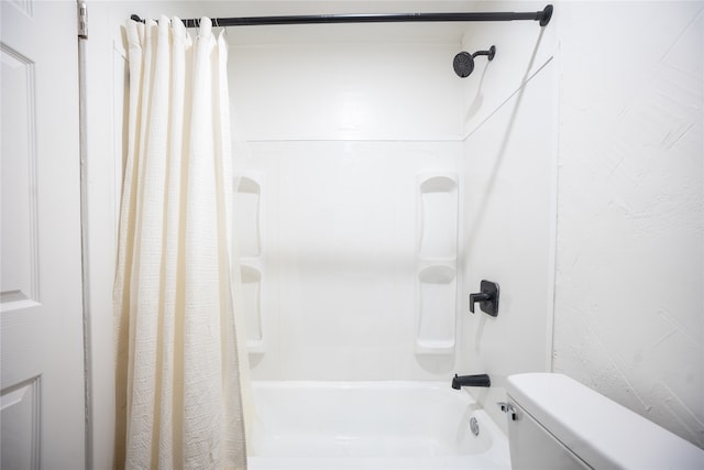 full bathroom with shower / tub combo and toilet