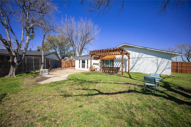 view of yard with a patio area, a pergola, and a fenced backyard