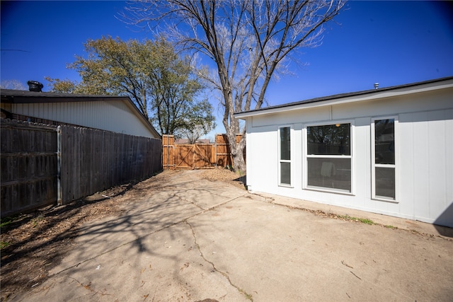 view of patio / terrace with a gate and fence