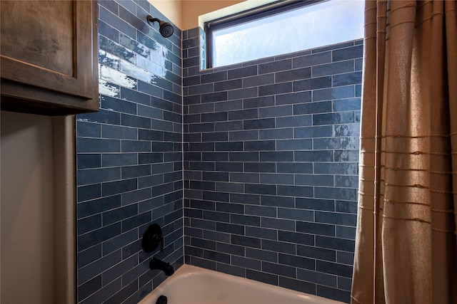 full bathroom featuring shower / bathtub combination with curtain