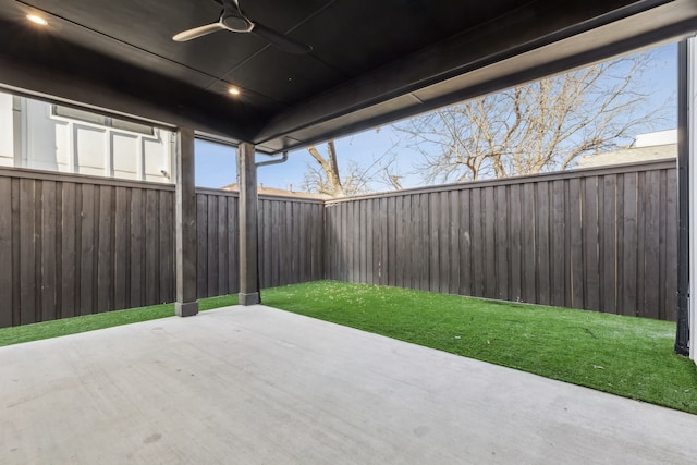 view of patio / terrace with a ceiling fan and a fenced backyard