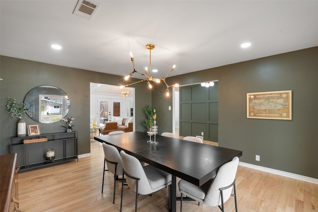 dining area with baseboards, visible vents, recessed lighting, french doors, and light wood-type flooring