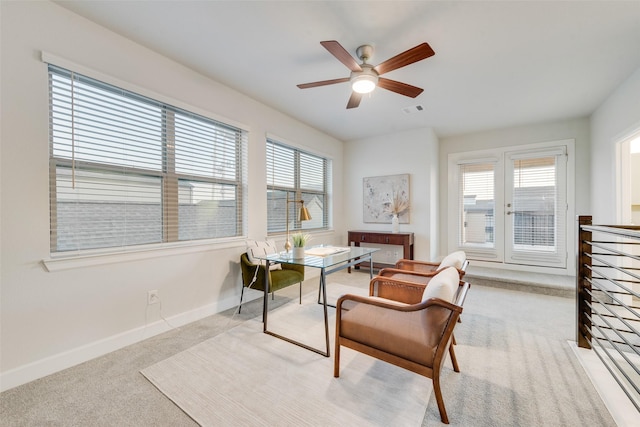 home office with visible vents, baseboards, ceiling fan, and carpet flooring