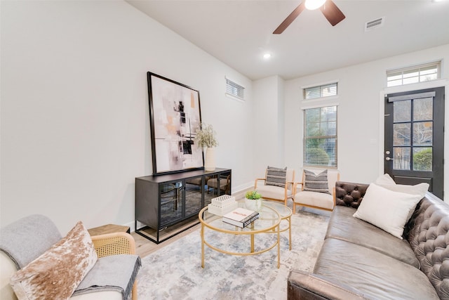 living room with visible vents, wood finished floors, recessed lighting, baseboards, and ceiling fan