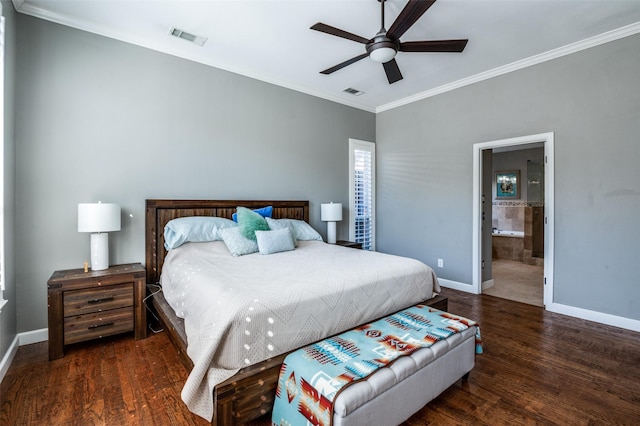 bedroom featuring visible vents, crown molding, baseboards, and wood finished floors