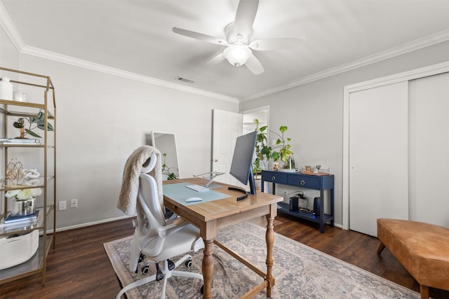 office space with visible vents, baseboards, ceiling fan, ornamental molding, and wood finished floors