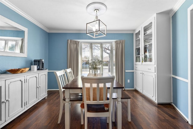 dining space with baseboards, an inviting chandelier, and dark wood-style floors