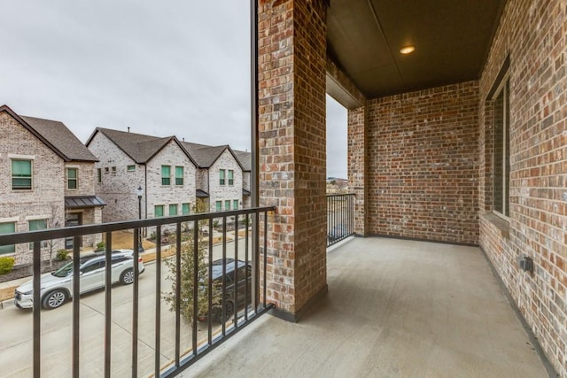 balcony featuring a residential view