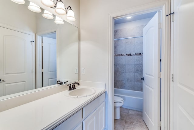 bathroom featuring tile patterned flooring, a chandelier, toilet, vanity, and  shower combination