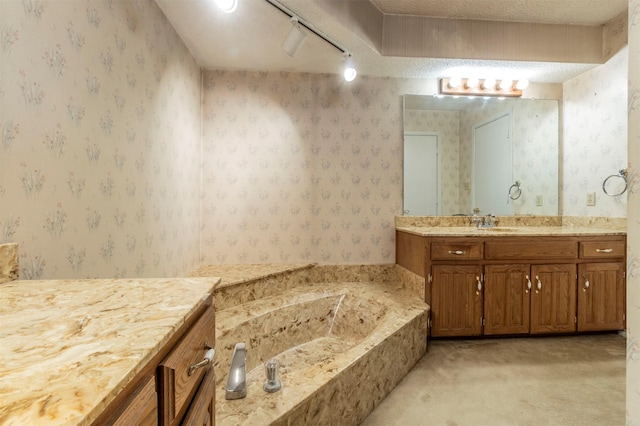 full bath with a textured ceiling, wallpapered walls, and a garden tub