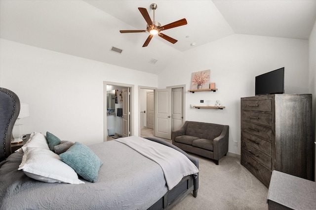 bedroom featuring lofted ceiling, light colored carpet, and ceiling fan