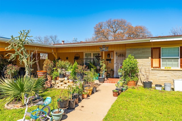 8308 Doreen Ave, Fort Worth, TX 76116 - view of front of house featuring stone siding and a front yard