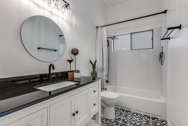 bathroom featuring vanity, shower / bath combination with curtain, toilet, and tile patterned floors