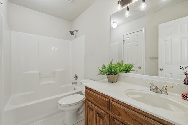 bathroom with toilet, vanity, and bathing tub / shower combination