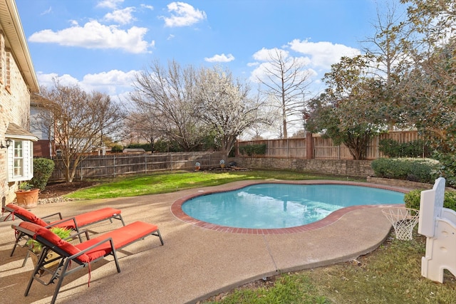 view of swimming pool featuring a fenced in pool, a patio, and a fenced backyard