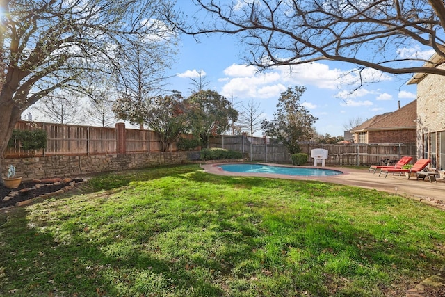 view of yard featuring a fenced in pool, a patio, and a fenced backyard