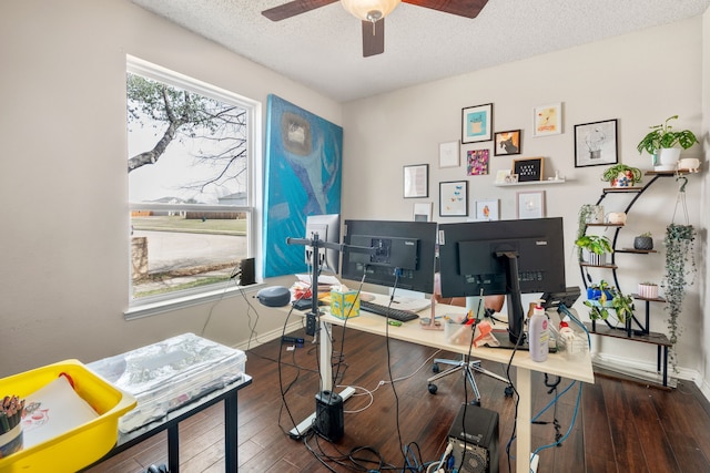 office with baseboards, a textured ceiling, a ceiling fan, and hardwood / wood-style flooring