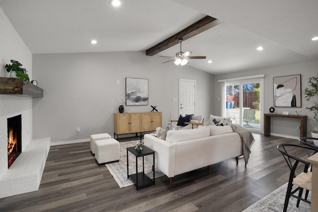 living room featuring baseboards, a brick fireplace, dark wood-style floors, and vaulted ceiling with beams