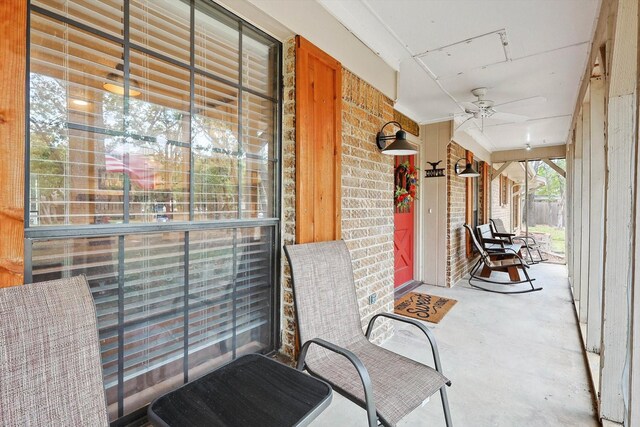 entryway with wood finished floors, baseboards, and french doors