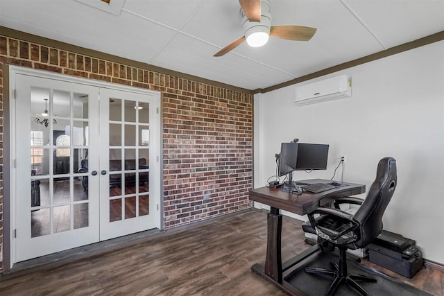 office area featuring brick wall, ceiling fan, a wall mounted air conditioner, french doors, and dark wood-style flooring