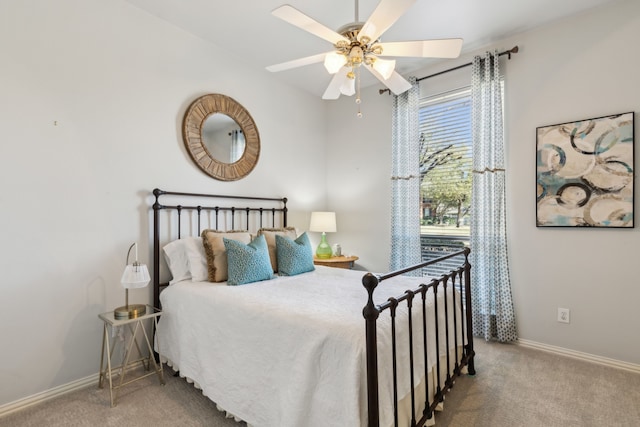 bedroom with carpet flooring, ceiling fan, and baseboards