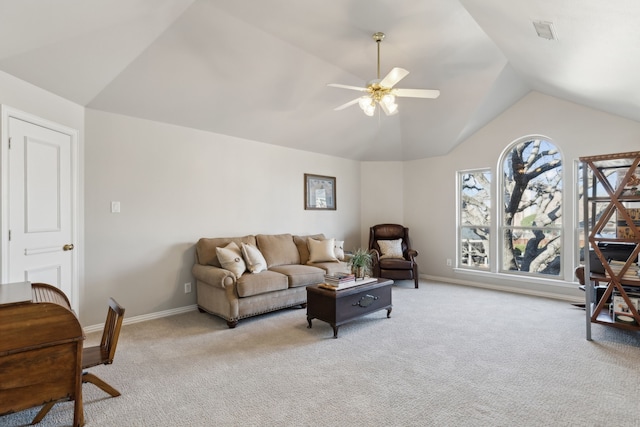 living room featuring baseboards, a ceiling fan, lofted ceiling, and carpet floors