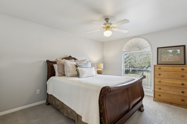 bedroom with baseboards, light carpet, and ceiling fan