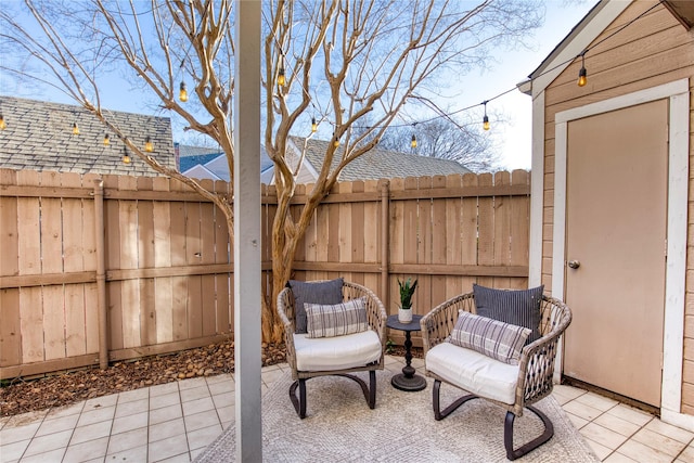 view of patio featuring a fenced backyard