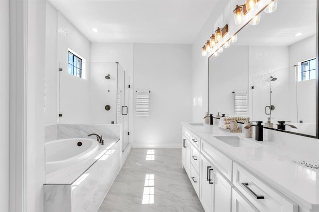 bathroom with a garden tub, marble finish floor, a stall shower, a sink, and double vanity