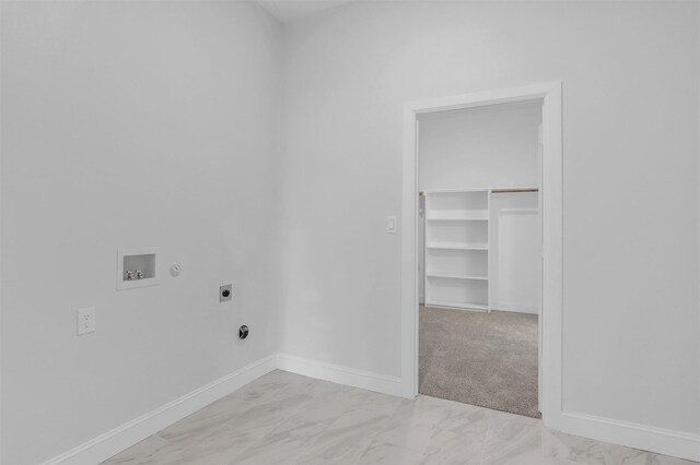 laundry area with hookup for a washing machine, baseboards, hookup for an electric dryer, laundry area, and marble finish floor