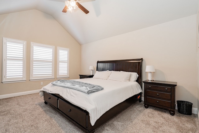 carpeted bedroom featuring baseboards, ceiling fan, and vaulted ceiling