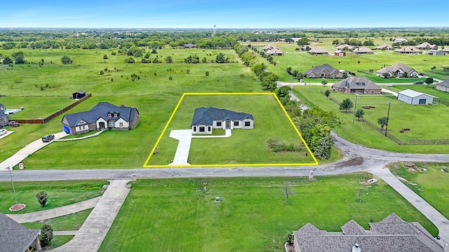 birds eye view of property with a residential view