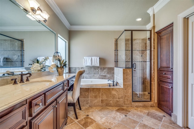 full bath with vanity, crown molding, a garden tub, and a shower stall