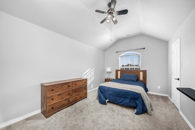 bedroom with lofted ceiling, baseboards, and carpet floors