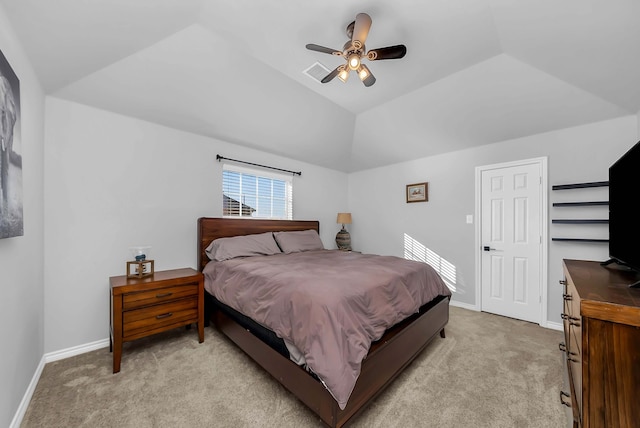 bedroom featuring vaulted ceiling, light colored carpet, baseboards, and visible vents