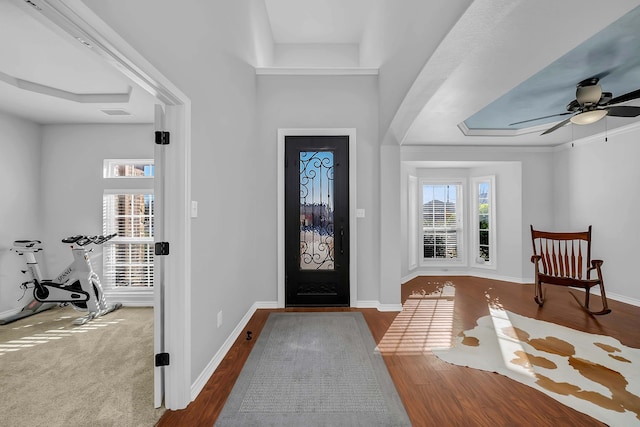 1416 Fence Post Dr, Fort Worth, TX 76052 - entrance foyer featuring arched walkways, stairway, wood finished floors, baseboards, and ceiling fan