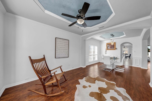 1416 Fence Post Dr, Fort Worth, TX 76052 - dining room featuring a lit fireplace, ceiling fan, stairway, wood finished floors, and arched walkways