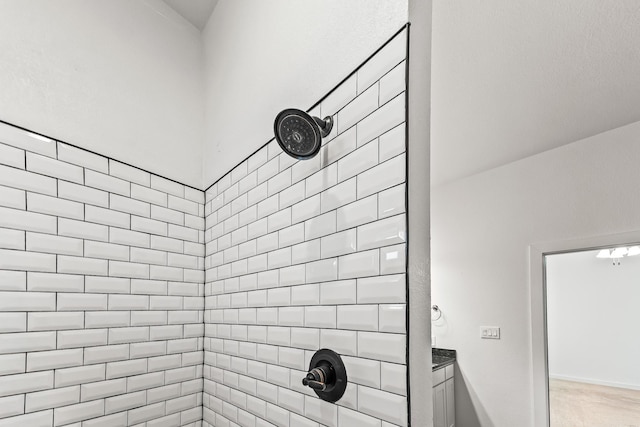 213 E 5th St, Ferris, TX 75125 - full bathroom featuring a tile shower, wood finished floors, and baseboards