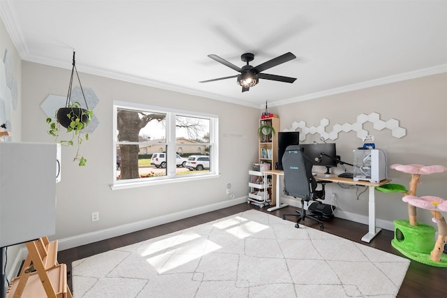 office space with ceiling fan, baseboards, wood finished floors, and ornamental molding