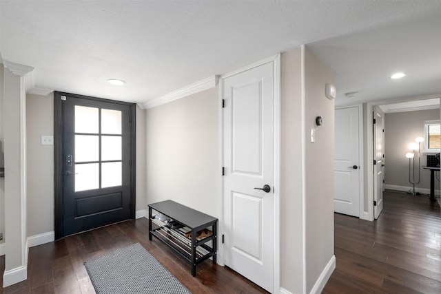 entrance foyer with recessed lighting, baseboards, dark wood-style floors, and ornamental molding