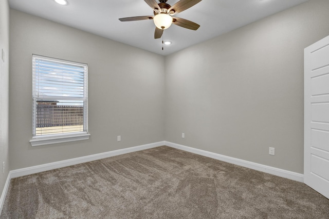 empty room with recessed lighting, baseboards, carpet, and ceiling fan