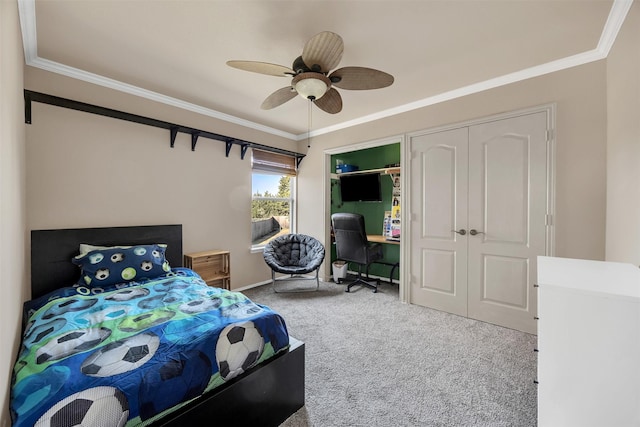 carpeted bedroom featuring ceiling fan and ornamental molding