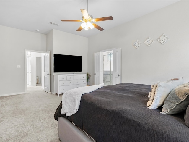 bedroom with visible vents, baseboards, light colored carpet, and ceiling fan