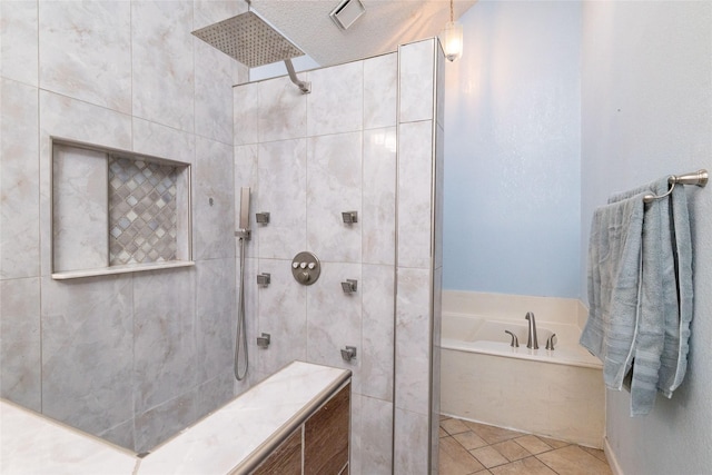 full bathroom featuring a bath and a tile shower